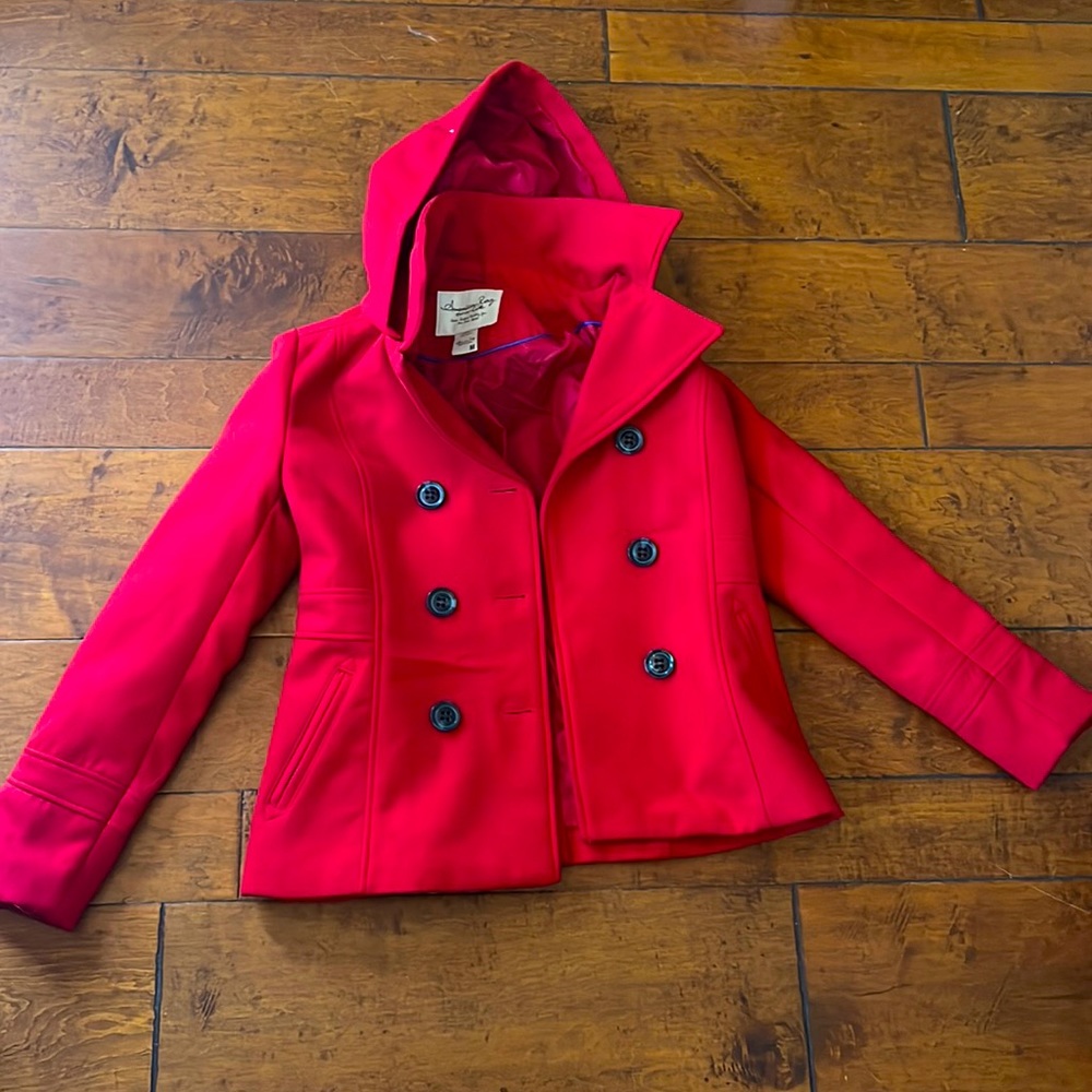 Woman’s Red winter jacket. Soft and thick. NEVER WORN.